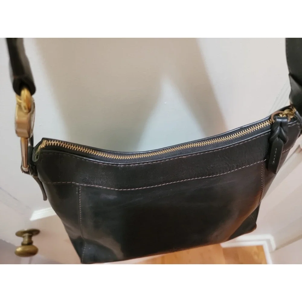 Dooney & Bourke Genuine Florentine Cassidy Hobo Shoulder Bag. Black Leather